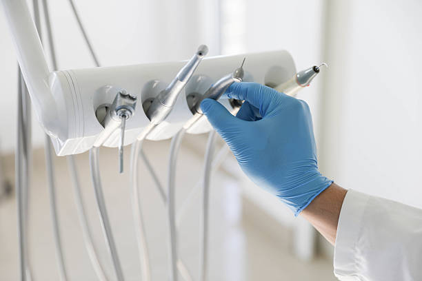 Professional Tooth Extraction technician working in Troy, NC